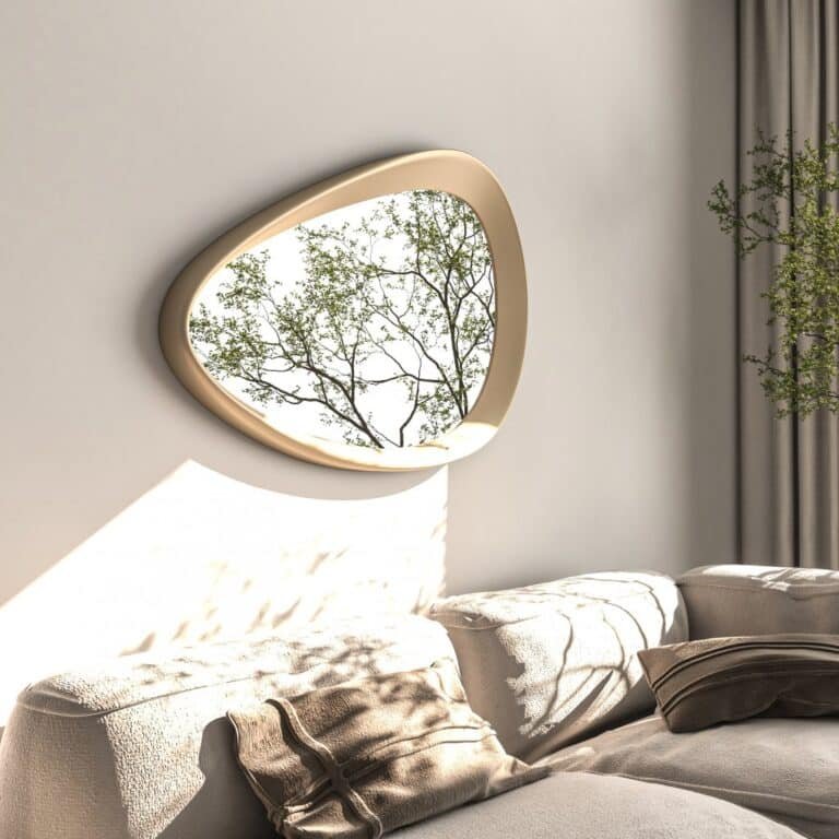 Freeform pebble mirror with semi-matt gold frame