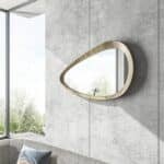 Freeform pebble wall mirror in birch wood finish