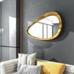 Organic curved wall mirror in light oak wood varnish
