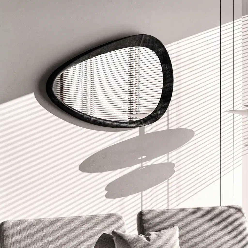 Sculptural organic wall mirror with matt black painted frame
