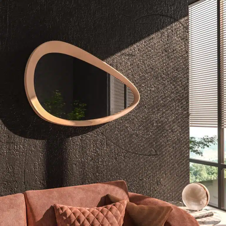 Freeform pebble mirror with semi-matt gold frame