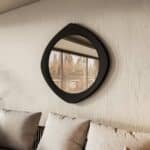 handmade hourglass wall mirror in Matt Black