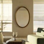 Walnut round wall mirror