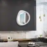 Organic pebble wall mirror in White finish