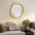 Designer sculptural mirror in Semi-Matt Gold