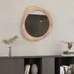 Sculptural pebble wall mirror in Beech finish