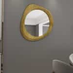 Pebble shaped organic mirror in Oak finish