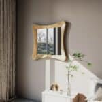 Handmade sculptural wall mirror in birch finish