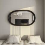 Handmade oval wall mirror in matte black