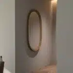 Handmade oval wall mirror in birch finish