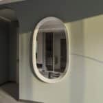 Handmade oval wall mirror in white wood finish